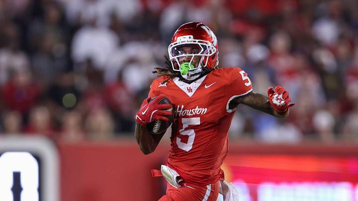 Sep 12, 2025; Houston, Texas, USA; Houston Cougars wide receiver Stephon Johnson (5) runs with the ball during the third quarter against the Colorado Buffaloes at TDECU Stadium. Mandatory Credit: Troy Taormina-Imagn Images Sep 12, 2025; Houston, Texas, USA; Houston Cougars wide receiver Stephon Johnson (5) runs with the ball during the third quarter against the Colorado Buffaloes at TDECU Stadium. Mandatory Credit: Troy Taormina-Imagn Images