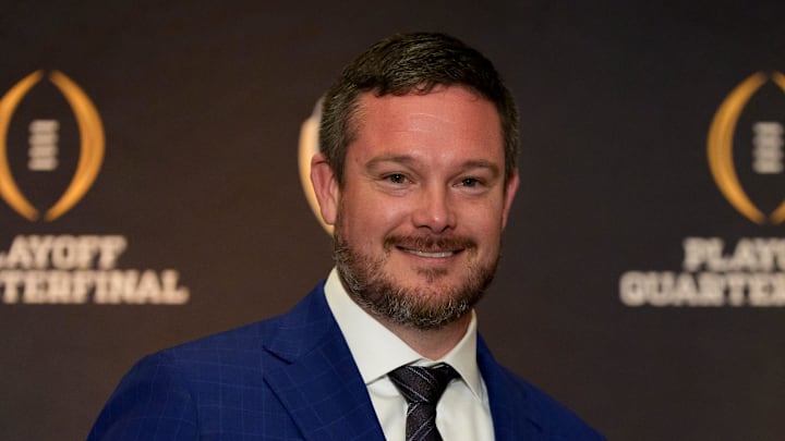Oregon head coach Dan Lanning holds an orange during the head coaches press conference ahead of Orange Bowl on Dec. 31, 2025, in Dania Beach, Florida.