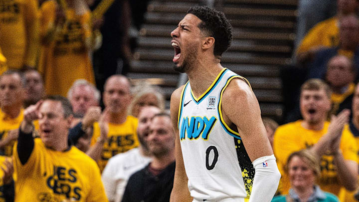 Apr 29, 2025; Indianapolis, Indiana, USA; Indiana Pacers guard Tyrese Haliburton (0) reacts during a time out during game five of the first round for the 2024 NBA Playoffs against the Milwaukee Bucks at Gainbridge Fieldhouse. Mandatory Credit: Trevor Ruszkowski-Imagn Images