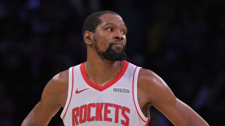 Houston Rockets forward Kevin Durant (7) looks on 