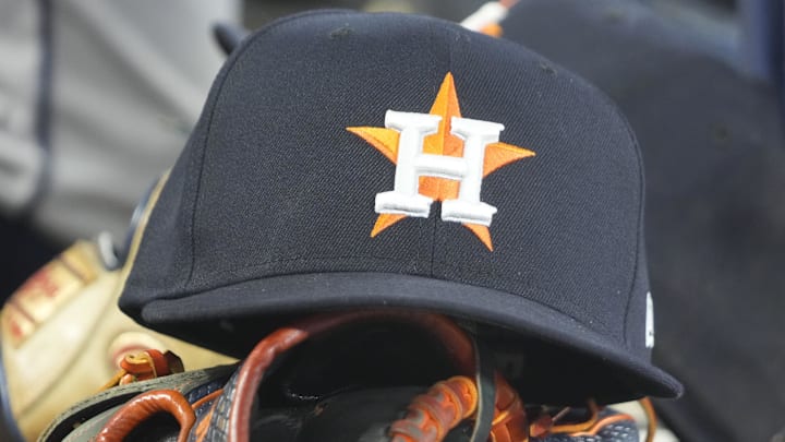 Sep 10, 2025; Toronto, Ontario, CAN; A detail view of a Houston Astros hat and ball glove in the dug out during a game against the Toronto Blue Jays at Rogers Centre. Sep 10, 2025; Toronto, Ontario, CAN; A detail view of a Houston Astros hat and ball glove in the dug out during a game against the Toronto Blue Jays at Rogers Centre.