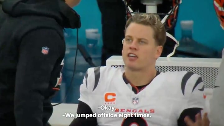 Joe Burrow complains to his coach about how poorly the team played.