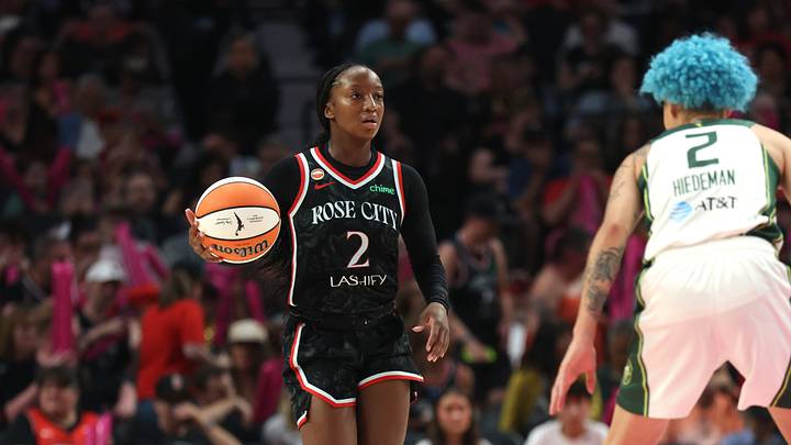 Aug 8, 2026; Portland, Oregon, USA;  Portland Fire guard Jordan Harrison (2) dribbles the ball up the court against Seattle Storm guard Natasha Hiedeman (2) during the second half at Moda Center. Mandatory Credit: Jaime Valdez-Imagn Images