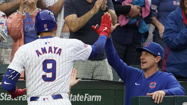 Sep 22, 2024; Chicago, Illinois, USA; Chicago Cubs catcher Miguel Amaya (9) is greeted by manager Craig Counsell (30) after hitting a two-run home run against the Washington Nationals during the fourth inning at Wrigley Field Sep 22, 2024; Chicago, Illinois, USA; Chicago Cubs catcher Miguel Amaya (9) is greeted by manager Craig Counsell (30) after hitting a two-run home run against the Washington Nationals during the fourth inning at Wrigley Field