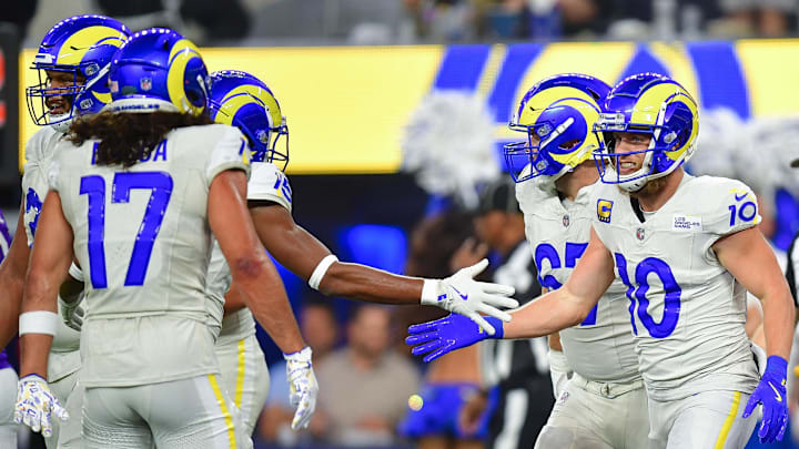 Oct 24, 2024; Inglewood, California, USA; Los Angeles Rams wide receiver Cooper Kupp (10) celebrates his touchdown scored against the Minnesota Vikings with wide receiver Demarcus Robinson (15) during the first half at SoFi Stadium. Mandatory Credit: Gary A. Vasquez-Imagn Images