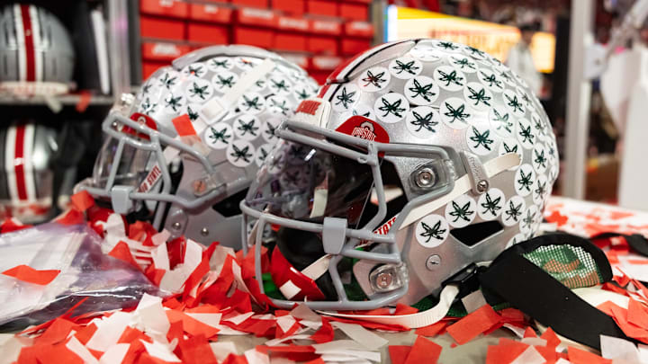 Jan 20, 2025; Atlanta, GA, USA; Detailed view of confetti with an Ohio State Buckeyes helmet after winning the CFP National Championship college football game at Mercedes-Benz Stadium. Mandatory Credit: Mark J. Rebilas-Imagn Images