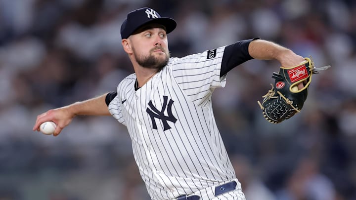 Jul 10, 2025; Bronx, New York, USA; New York Yankees relief pitcher JT Brubaker (34) pitches against the Seattle Mariners during the eighth inning at Yankee Stadium. Mandatory Credit: Brad Penner-Imagn Images