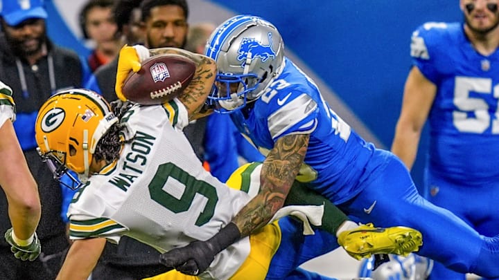 Former Detroit Lions cornerback Carlton Davis III (23) forces Green Bay Packers wide receiver Christian Watson (9) to fumble Former Detroit Lions cornerback Carlton Davis III (23) forces Green Bay Packers wide receiver Christian Watson (9) to fumble