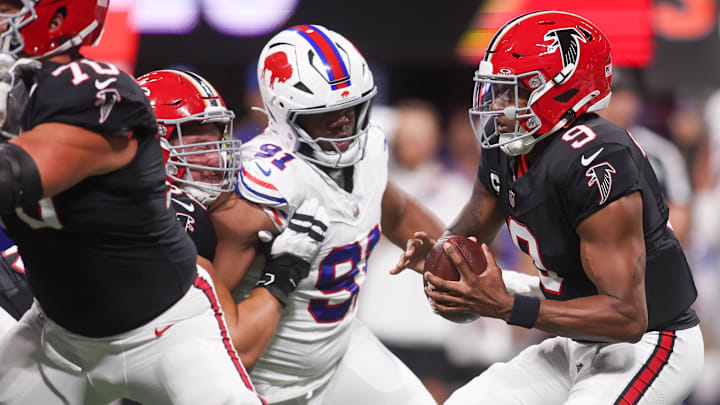 Buffalo Bills defensive tackle Ed Oliver (91) applies the pressure on Atlanta Falcons quarterback Michael Penix Jr. (9) during the first half of a game at Mercedes-Benz Stadium.