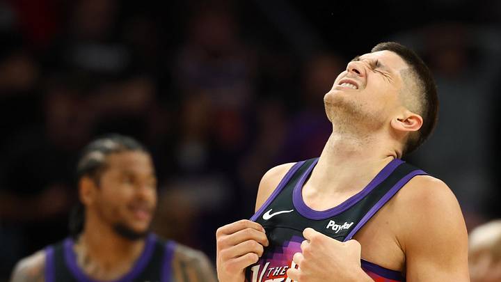 Feb 21, 2026; Phoenix, Arizona, USA; Phoenix Suns guard Grayson Allen (8) reacts against the Orlando Magic in overtime at Mortgage Matchup Center. Mandatory Credit: Mark J. Rebilas-Imagn Images