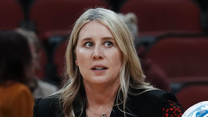 Louisville head coach Dani Busboom Kelly helps her team warm up ahead of their Final Four match against Pittsburgh at the KFC Yum! Center in Louisville, Ky. on Dec. 19, 2024.