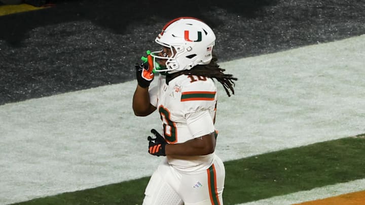 Jan 19, 2026; Miami Gardens, FL, USA; Miami Hurricanes wide receiver Malachi Toney (10) celebrates after scoring a touchdown against the Indiana Hoosiers in the fourth quarter during the College Football Playoff National Championship game at Hard Rock Stadium. Mandatory Credit: Kim Klement Neitzel-Imagn Images