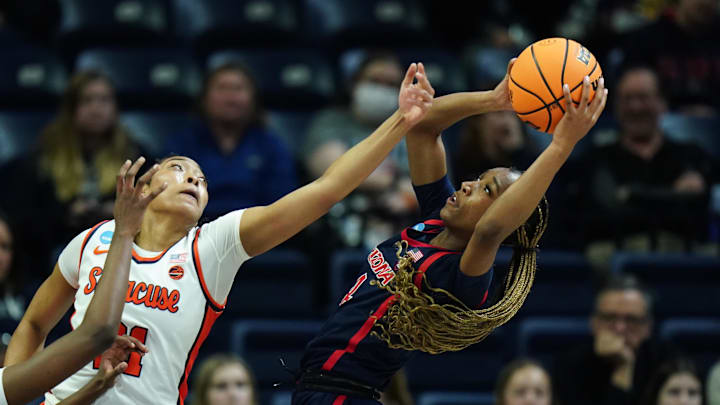 Mar 23, 2024; Storrs, Connecticut, USA; Syracuse Orange forward Saniaa Wilson (21) defends against Arizona Wildcats guard Skylar Jones (4) in the second half at Harry A. Gampel Pavilion. Mandatory Credit: David Butler II-Imagn Images Mar 23, 2024; Storrs, Connecticut, USA; Syracuse Orange forward Saniaa Wilson (21) defends against Arizona Wildcats guard Skylar Jones (4) in the second half at Harry A. Gampel Pavilion. Mandatory Credit: David Butler II-Imagn Images