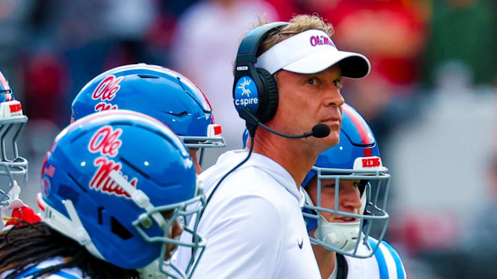 Ole Miss Rebels head coach Lane Kiffin during a timeout with his players during the second half against the Oklahoma Sooners