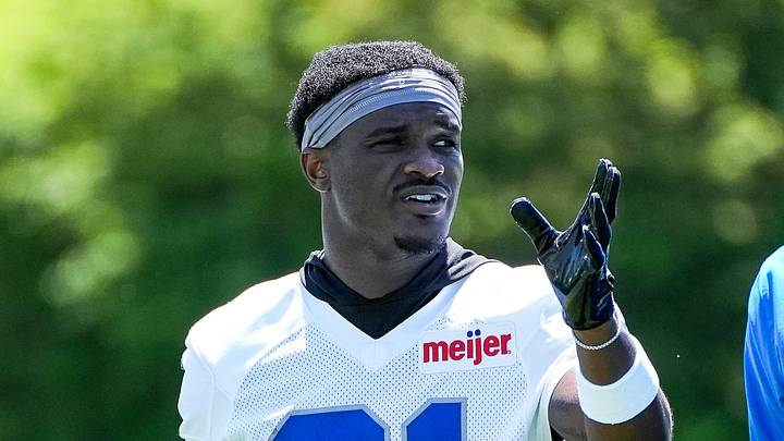 Detroit Lions cornerback Roger McCreary (21) talks to defensive quality control Dre Thompson during OTAs at Meijer Performance Center in Allen Park on Friday, May 29, 2026. Detroit Lions cornerback Roger McCreary (21) talks to defensive quality control Dre Thompson during OTAs at Meijer Performance Center in Allen Park on Friday, May 29, 2026.