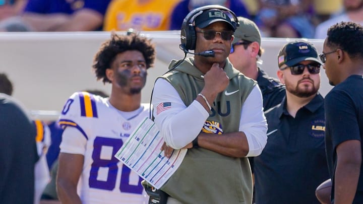 Nov 15, 2025; Baton Rouge, Louisiana, USA; LSU Tigers interim head coach Frank Wilson III looks on against the Arkansas Razorbacks during the second half at Tiger Stadium. Mandatory Credit: Stephen Lew-Imagn Images Nov 15, 2025; Baton Rouge, Louisiana, USA; LSU Tigers interim head coach Frank Wilson III looks on against the Arkansas Razorbacks during the second half at Tiger Stadium. Mandatory Credit: Stephen Lew-Imagn Images
