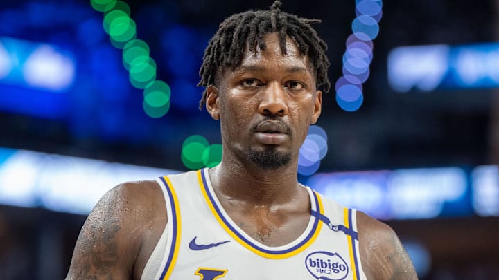 Los Angeles Lakers forward Dorian Finney-Smith reacts to a play.