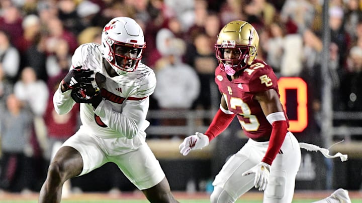 Oct 25, 2024; Chestnut Hill, Massachusetts, USA; Louisville Cardinals wide receiver Chris Bell (0) runs after making a catch against the Boston College Eagles during the first half at Alumni Stadium.