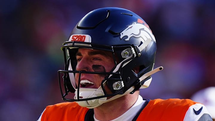 Jan 17, 2026; Denver, CO, USA; Denver Broncos quarterback Bo Nix (10) calls an audible during the first quarter of an AFC Divisional Round playoff game against the Buffalo Bills at Empower Field at Mile High. Mandatory Credit: Ron Chenoy-Imagn Images