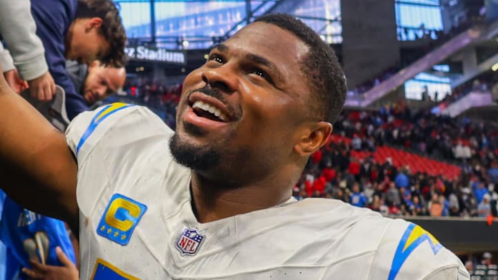 Dec 1, 2024; Atlanta, Georgia, USA; Los Angeles Chargers linebacker Khalil Mack (52) celebrates with fans after a victory over the Atlanta Falcons at Mercedes-Benz Stadium. Mandatory Credit: Brett Davis-Imagn Images