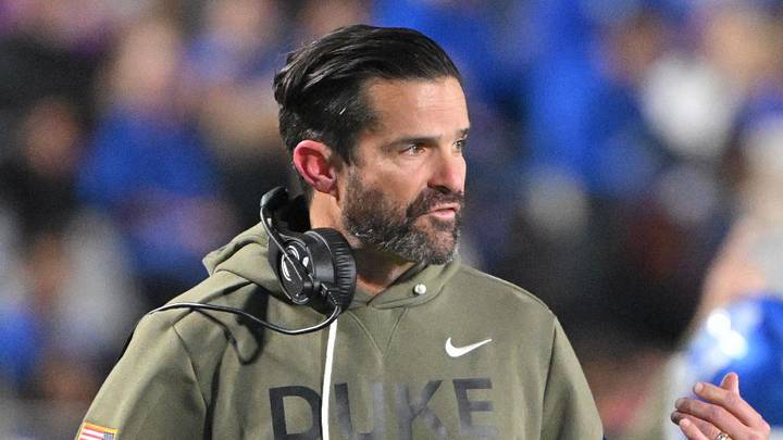 Nov 15, 2025; Durham, North Carolina, USA; Duke Blue Devils head coach Manny Diaz reacts during the third quarter against the Virginia Cavaliers at Wallace Wade Stadium. Mandatory Credit: Zachary Taft-Imagn Images Nov 15, 2025; Durham, North Carolina, USA; Duke Blue Devils head coach Manny Diaz reacts during the third quarter against the Virginia Cavaliers at Wallace Wade Stadium. Mandatory Credit: Zachary Taft-Imagn Images
