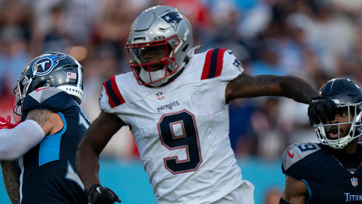 Tennessee Titans safety Amani Hooker (37) intercepts a pass intended for New England Patriots wide receiver Kayshon Boutte (9) In overtime of their game at Nissan Stadium in Nashville, Tenn., Sunday, Nov. 3, 2024. The play ended the game with the Titans up 20-17 on the Patriots.