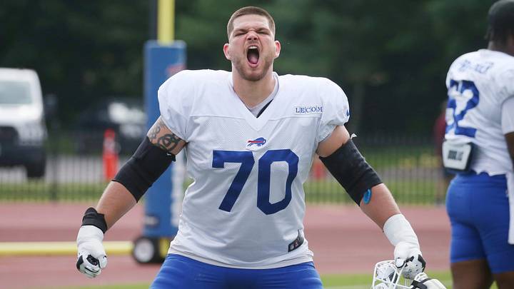 Bills offensive lineman Alec Anderson gives a loud roar towards the sidelines as the unit warms up during day six of the Buffalo Bills training camp. Bills offensive lineman Alec Anderson gives a loud roar towards the sidelines as the unit warms up during day six of the Buffalo Bills training camp.