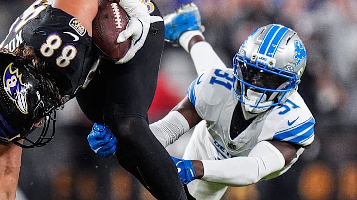 Detroit Lions safety Kerby Joseph (31) tackles Baltimore Ravens tight end Charlie Kolar (88) during the second half 