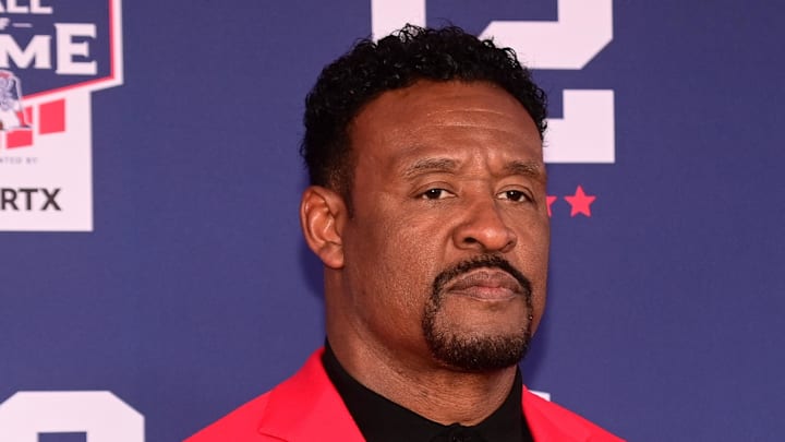 Jun 12, 2024; Foxborough, MA, USA; Former NFL player Willie McGinest poses for a photo at the New England Patriots Hall of Fame induction ceremony for Tom Brady at Gillette Stadium. Mandatory Credit: Eric Canha-Imagn Images