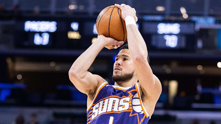 Mar 12, 2026; Indianapolis, Indiana, USA;  Phoenix Suns guard Devin Booker (1) shoots the ball  in the second half against the Indiana Pacers at Gainbridge Fieldhouse. Mandatory Credit: Trevor Ruszkowski-Imagn Images