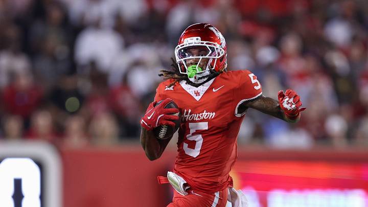 Sep 12, 2025; Houston, Texas, USA; Houston Cougars wide receiver Stephon Johnson (5) runs with the ball during the third quarter against the Colorado Buffaloes at TDECU Stadium. Mandatory Credit: Troy Taormina-Imagn Images Sep 12, 2025; Houston, Texas, USA; Houston Cougars wide receiver Stephon Johnson (5) runs with the ball during the third quarter against the Colorado Buffaloes at TDECU Stadium. Mandatory Credit: Troy Taormina-Imagn Images