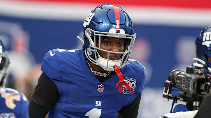 Dec 29, 2024; East Rutherford, New Jersey, USA; New York Giants wide receiver Malik Nabers (1) celebrates after a touchdown reception during the second half against the Indianapolis Colts at MetLife Stadium.  