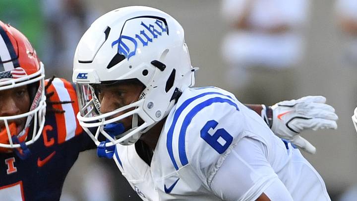Sep 12, 2026; Champaign, Illinois, USA; Duke Blue Devils wide receiver Jonah Burton (6) runs the ball past Illinois Fighting Illini defensive back Xavier Scott (1) and defensive back Tywan Cox (32) during the second half at Gies Memorial Stadium. Mandatory Credit: Ron Johnson-Imagn Images Sep 12, 2026; Champaign, Illinois, USA; Duke Blue Devils wide receiver Jonah Burton (6) runs the ball past Illinois Fighting Illini defensive back Xavier Scott (1) and defensive back Tywan Cox (32) during the second half at Gies Memorial Stadium. Mandatory Credit: Ron Johnson-Imagn Images