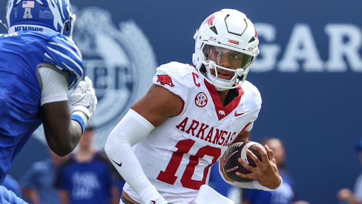 Arkansas Razorbacks quarterback Taylen Green (10) runs with the ball against the Memphis Tigers during the first half at Simmons Bank Liberty Stadium. Arkansas Razorbacks quarterback Taylen Green (10) runs with the ball against the Memphis Tigers during the first half at Simmons Bank Liberty Stadium.