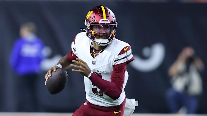 Sep 23, 2024; Cincinnati, Ohio, USA; Washington Commanders quarterback Jayden Daniels (5) runs during the fourth quarter against the Cincinnati Bengals at Paycor Stadium. Mandatory Credit: Joseph Maiorana-Imagn Images Sep 23, 2024; Cincinnati, Ohio, USA; Washington Commanders quarterback Jayden Daniels (5) runs during the fourth quarter against the Cincinnati Bengals at Paycor Stadium. Mandatory Credit: Joseph Maiorana-Imagn Images
