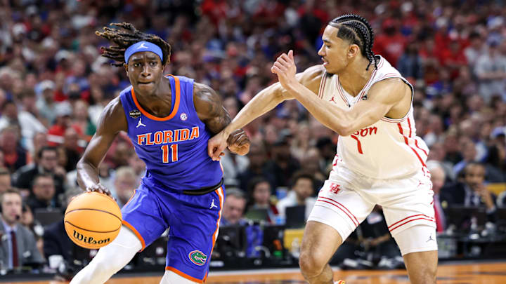 Florida Gators guard Denzel Aberdeen drives to the paint during the team's win over Houston in the national championship.