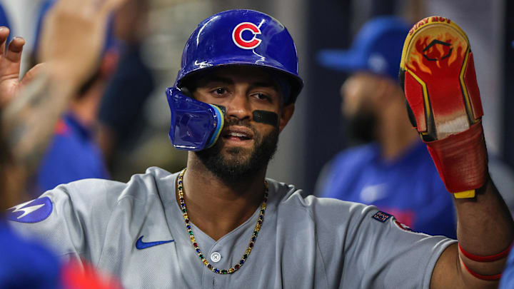 Sep 9, 2025; Cumberland, Georgia, USA; Chicago Cubs outfielder Willi Castro (1) celebrates scoring a run against the Atlanta Braves during the eighth inning at Truist Park. Mandatory Credit: Jordan Godfree-Imagn Images