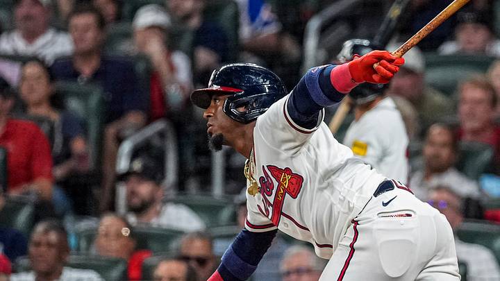 Jul 30, 2026; Cumberland, Georgia, USA; Atlanta Braves second baseman Ozzie Albies (1) hits a single to drive in two runs against the Washington Nationals during the sixth inning at Truist Park. Mandatory Credit: Dale Zanine-Imagn Images