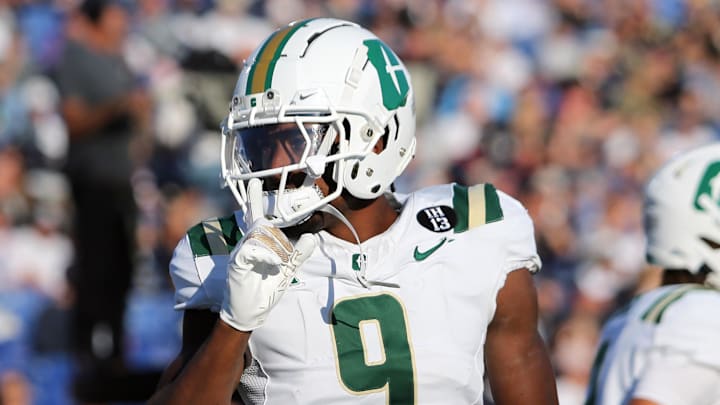 Charlotte 49ers wide receiver O'Mega Blake (9) celebrates after scoring a touchdown during the first half against the Navy Midshipmen at Navy-Marine Corps Memorial Stadium. Charlotte 49ers wide receiver O'Mega Blake (9) celebrates after scoring a touchdown during the first half against the Navy Midshipmen at Navy-Marine Corps Memorial Stadium.