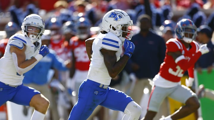 Sep 7, 2024; Oxford, Mississippi, USA; Middle Tennessee Blue Raiders wide receiver Omari Kelly (1) runs after a catch during the first half against the Mississippi Rebels at Vaught-Hemingway Stadium.
