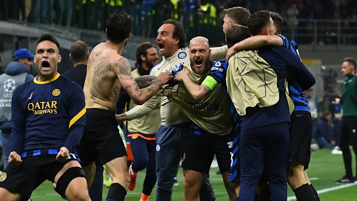 Inter Milan celebrate Francesco Acerbi's goal to save the Italian club's campaign late in stoppage time.