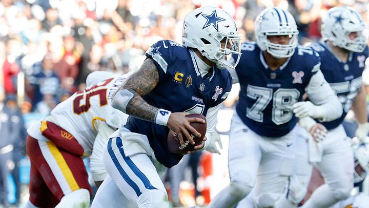 Dallas Cowboys QB Dak Prescott scrambles with the ball defended by Washington Commanders DT Jer'Zhan Newton. Dallas Cowboys QB Dak Prescott scrambles with the ball defended by Washington Commanders DT Jer'Zhan Newton.