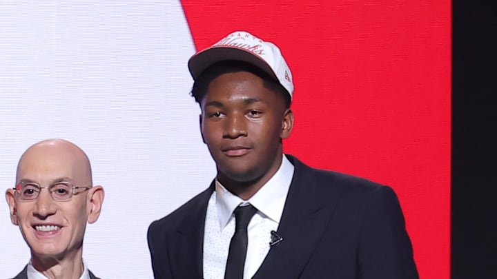 Jun 25, 2025; Brooklyn, NY, USA;  Derik Queen stands with NBA commissioner Adam Silver after being selected as the 13th pick by the Atlanta Hawks in the first round of the 2025 NBA Draft at Barclays Center. Mandatory Credit: Brad Penner-Imagn Images