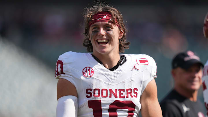 Oklahoma quarterback John Mateer (10) has emerged as an early favorite to win the Heisman Trophy and his Sooners are Rece Davis' pick to win against Auburn this weekend.