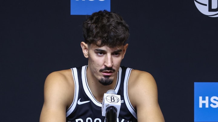 Sep 23, 2025; Brooklyn, NY, USA; Brooklyn Nets guard Ben Saraf (77) speaks at Media Day. Mandatory Credit: Wendell Cruz-Imagn Images Sep 23, 2025; Brooklyn, NY, USA; Brooklyn Nets guard Ben Saraf (77) speaks at Media Day. Mandatory Credit: Wendell Cruz-Imagn Images
