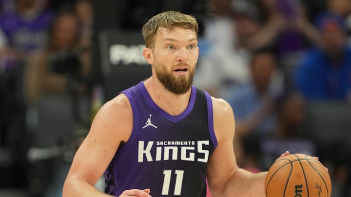 Apr 11, 2025; Sacramento, California, USA; Sacramento Kings forward Domantas Sabonis (11) dribbles against the Los Angeles Clippers during the second quarter at Golden 1 Center.