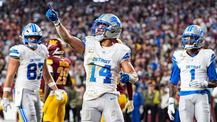 Detroit Lions wide receiver Amon-Ra St. Brown (14) celebrates a touchdown against Washington Commanders 