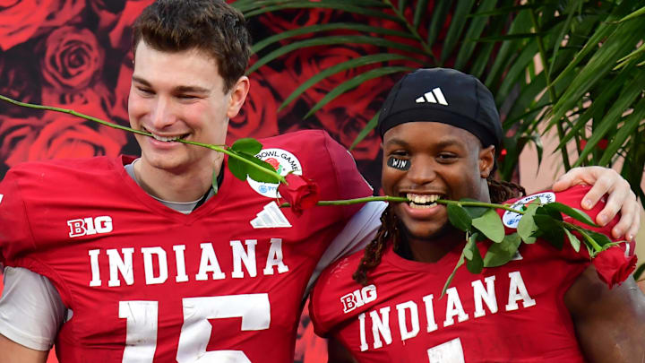 Jan 1, 2026; Pasadena, CA, USA; Indiana Hoosiers quarterback Fernando Mendoza (15) and running back Roman Hemby (1) celebrate after defeating the Alabama Crimson Tide in the 2026 Rose Bowl and quarterfinal game of the College Football Playoff at Rose Bowl Stadium. 