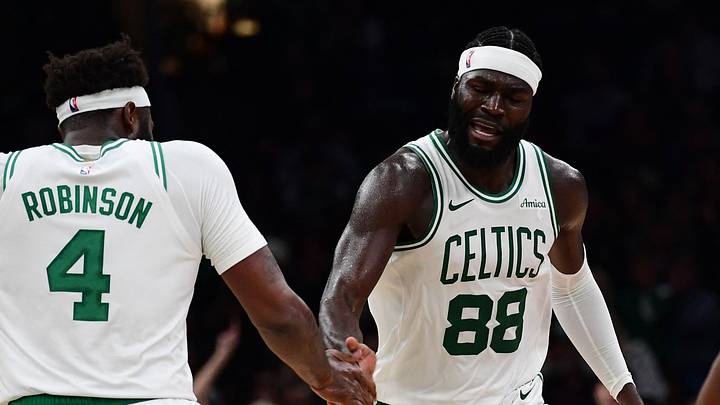 Oct 14, 2026; Boston, Massachusetts, USA; Boston Celtics center Neemias Queta (88) is congratulated by Boston Celtics center Mitchell Robinson (4) after making a basket during the second half against the Charlotte Hornets at TD Garden. Mandatory Credit: Bob DeChiara-Imagn Images Oct 14, 2026; Boston, Massachusetts, USA; Boston Celtics center Neemias Queta (88) is congratulated by Boston Celtics center Mitchell Robinson (4) after making a basket during the second half against the Charlotte Hornets at TD Garden. Mandatory Credit: Bob DeChiara-Imagn Images