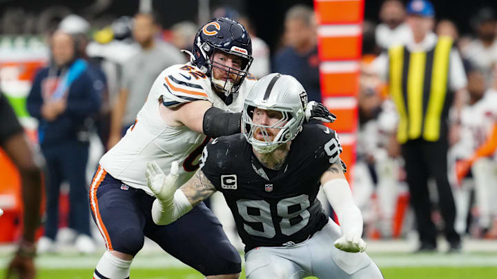 Sep 28, 2025; Paradise, Nevada, USA; Chicago Bears guard Joe Thuney (62) attempts to stop Las Vegas Raiders defensive end Maxx Crosby (98) during the second half at Allegiant Stadium. Mandatory Credit: Stephen R. Sylvanie-Imagn Images Sep 28, 2025; Paradise, Nevada, USA; Chicago Bears guard Joe Thuney (62) attempts to stop Las Vegas Raiders defensive end Maxx Crosby (98) during the second half at Allegiant Stadium. Mandatory Credit: Stephen R. Sylvanie-Imagn Images